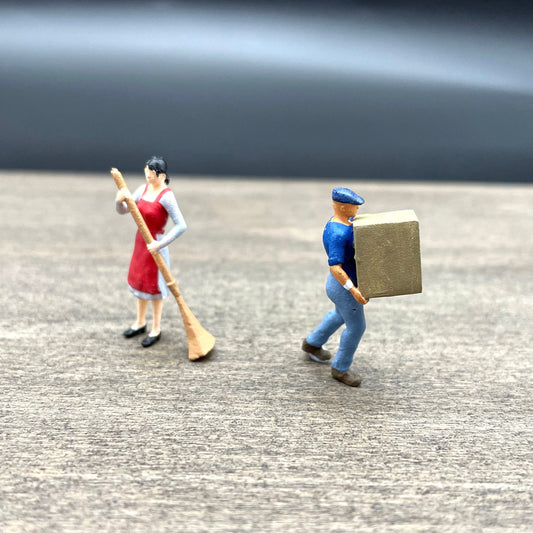 Woman Cleaning, Man Carrying Box. Miniature Human Figures. 1:64 Scale